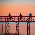 Four cyclists getting outside for sunrise at the Trapiche in Pelotas, Brazil